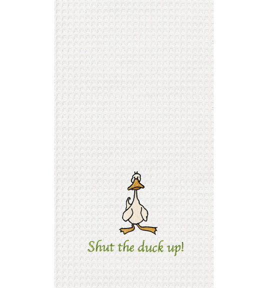 White towel with beige and yellow duck on top of green text reading "Shut the duck up!"