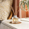 Reed Diffuser-Seaspray on a bedside table.