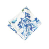 Blue and white cloth napkin with sealife, shells, and coral