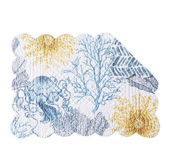 White placemat with blue and yellow sealife and vegetation.