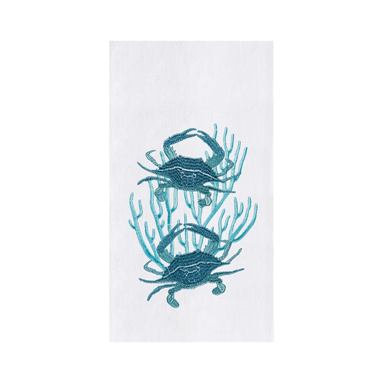 A towel with two blue crabs on top of blue coral.