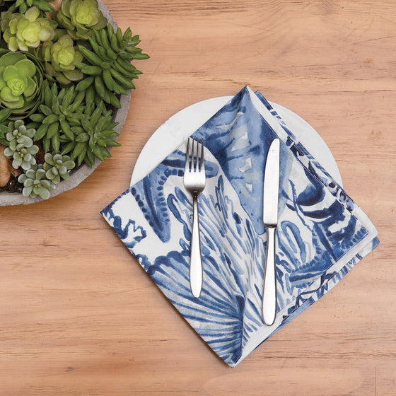 Blue Coast Shells Napkin in a table placesetting