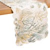 Table runner with green, blue, and beige schools of fish on a white background