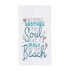 White towel with blue and brown phrase "nothing soothes the soul like a walk on the beach."