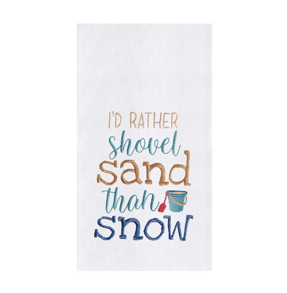 White towel with brown and blue text reading "I'd rather shovel sand than snow."