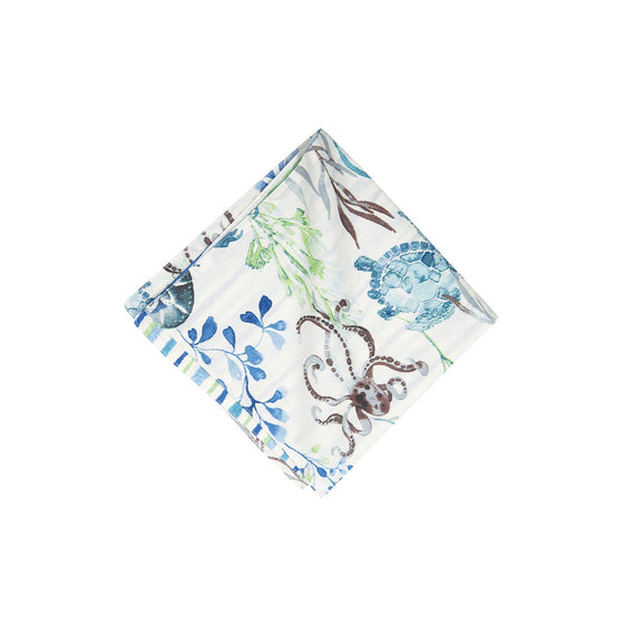Napkin with blue-green and brown design of sealife and vegetation.