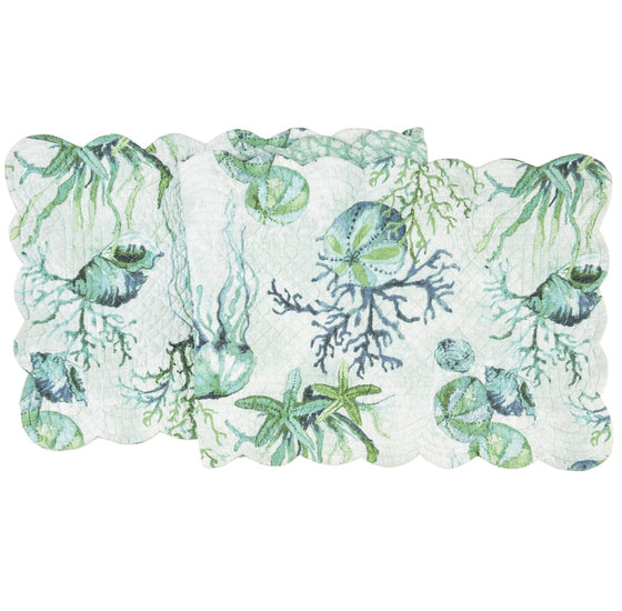 Table runner with green, teal, and blue sealife, shells, and vegetation.